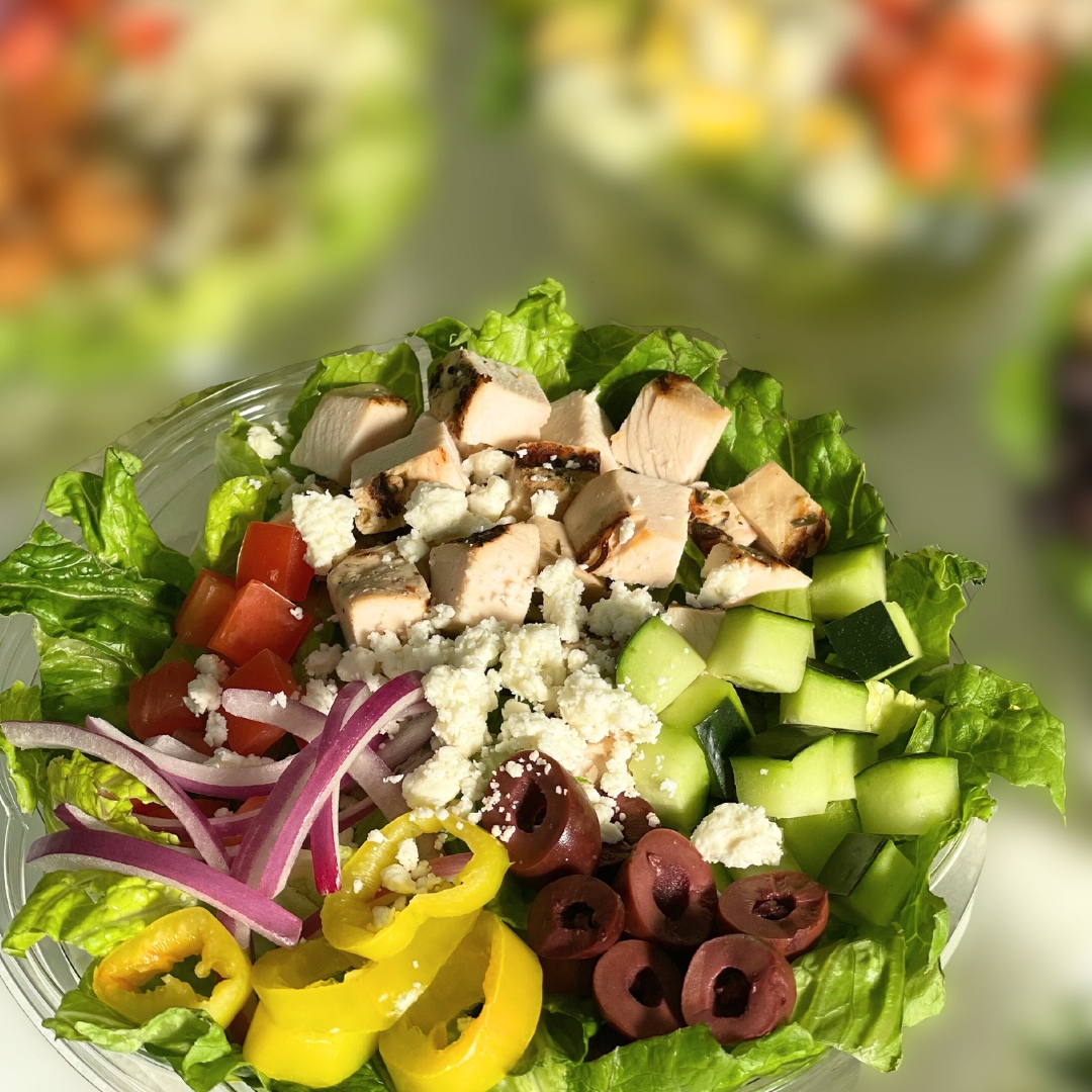 A chopped salad in a plastic cup from Bread Zeppelin